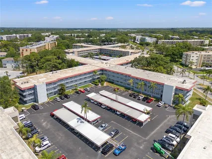 an aerial view of a city with ocean view