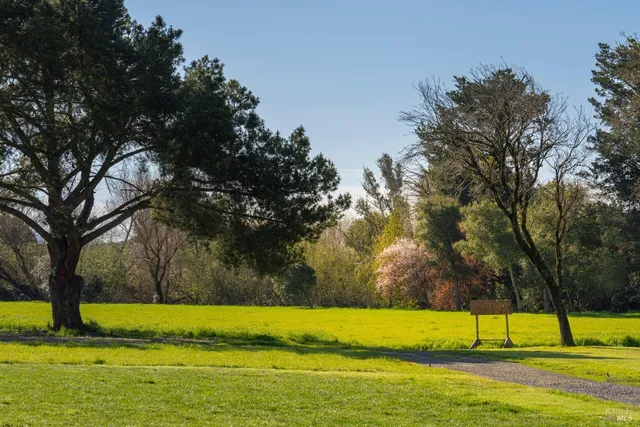 a view of swimming pool with an outdoor space and seating area