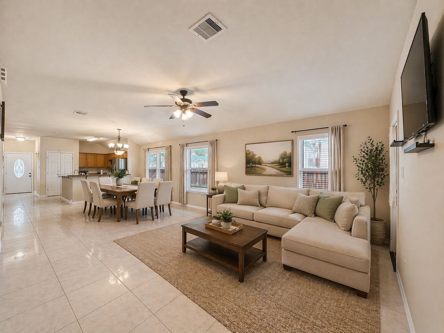 6614 Pine Tree Springs Houston, TX 77049 - Photo 1 of 14 a living room with furniture and a flat screen tv