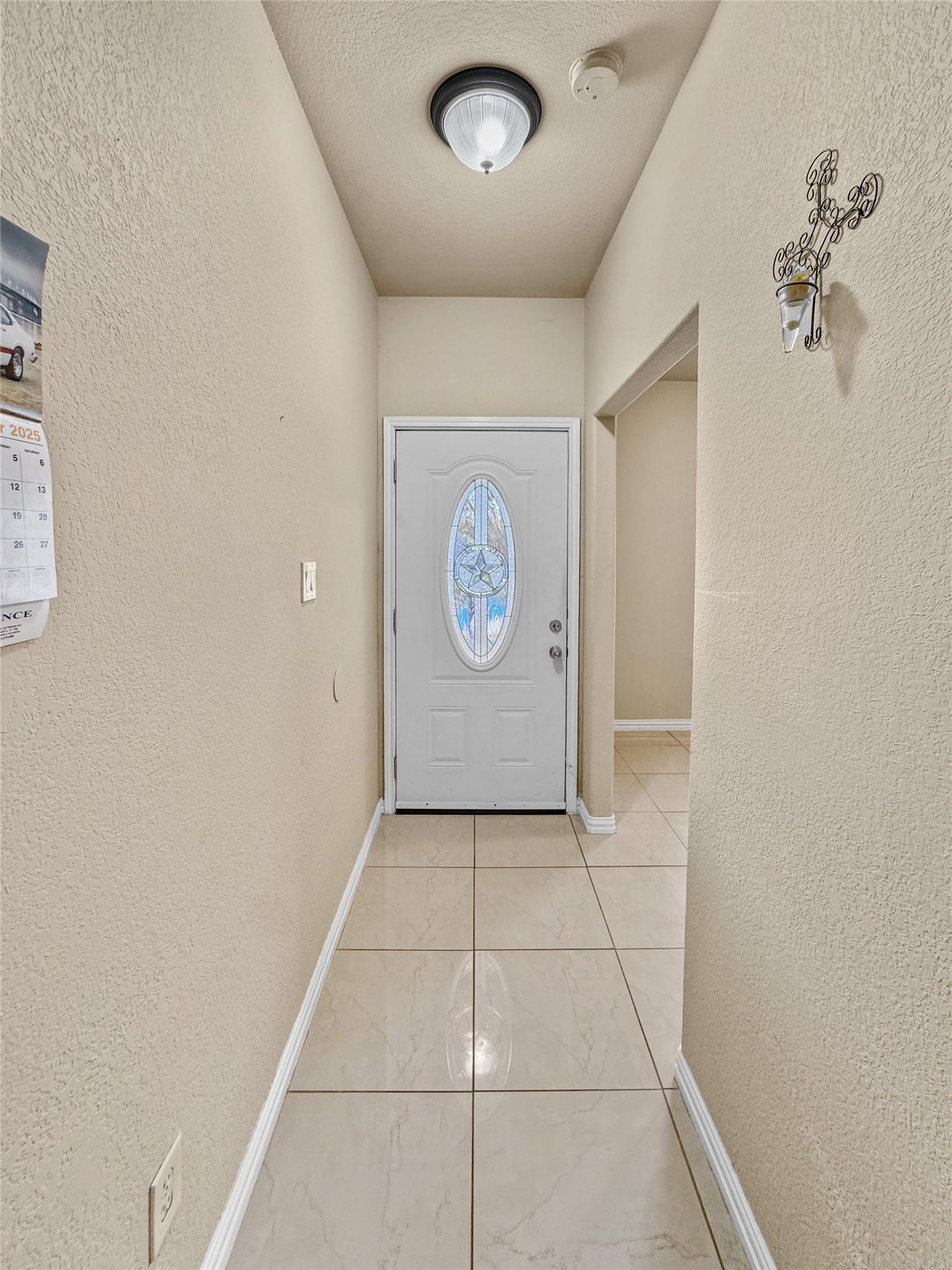 6614 Pine Tree Springs Houston, TX 77049 - Photo 2 of 14 a view of a hallway with elevator