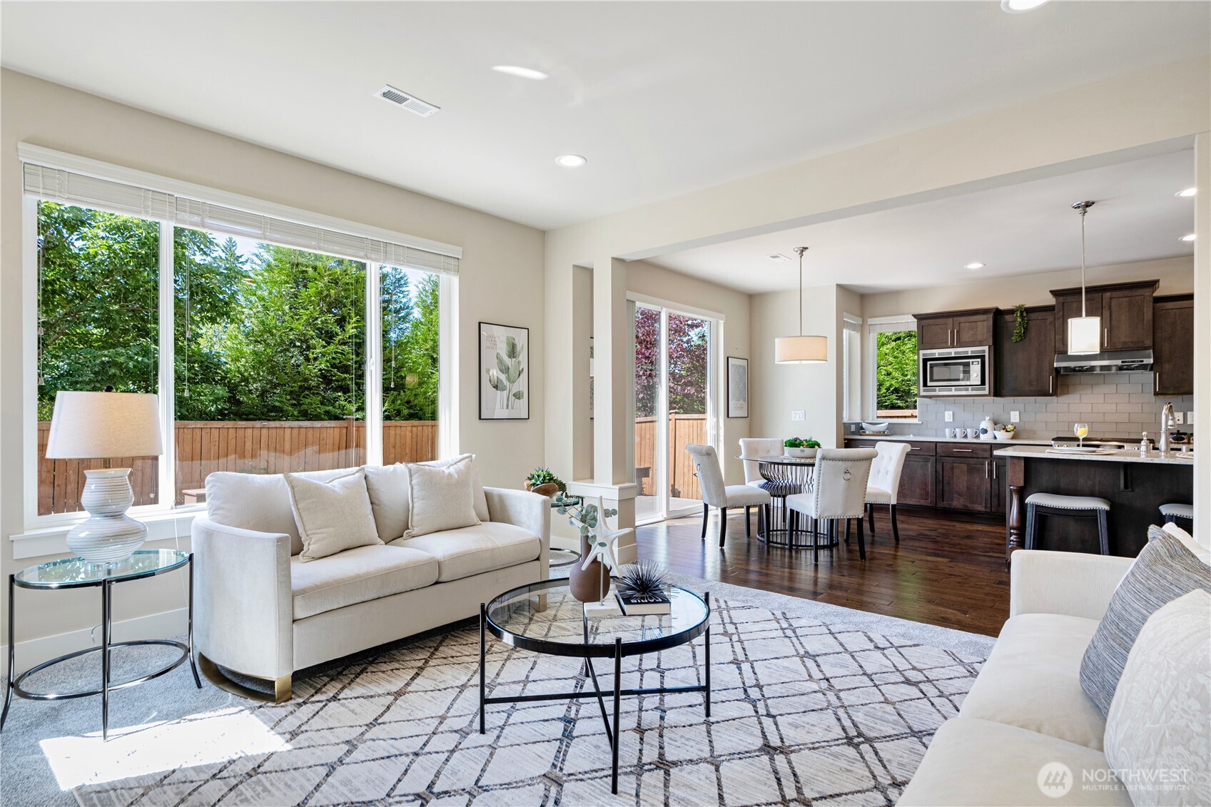 3718 226th Place Southeast Bothell, WA 98021 - Photo 12 of 30 a living room with furniture and a large window