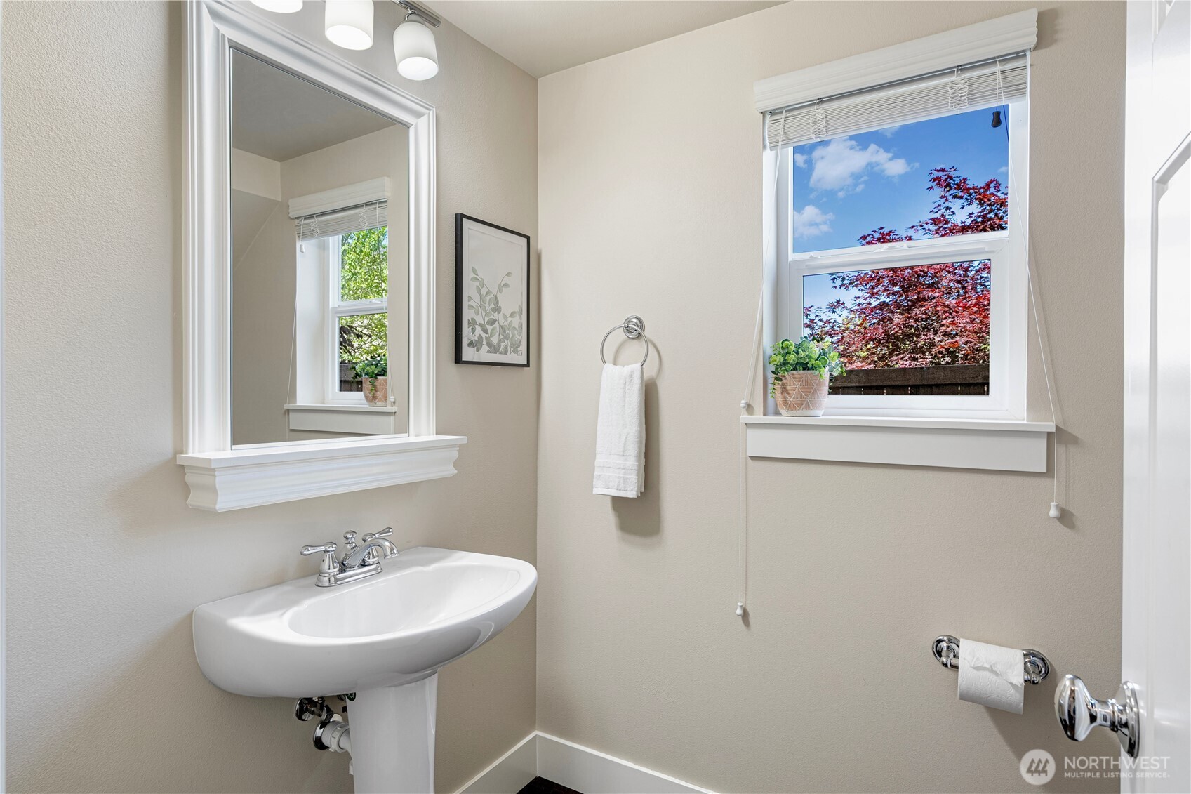 3718 226th Place Southeast Bothell, WA 98021 - Photo 20 of 30 a bathroom with a sink and a mirror