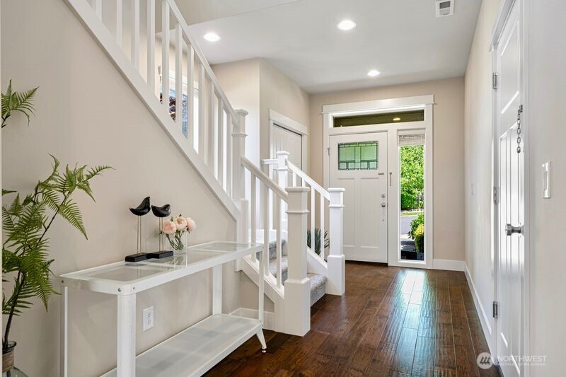 3718 226th Place Southeast Bothell, WA 98021 - Photo 2 of 30 a view of entryway with wooden floor and stairs