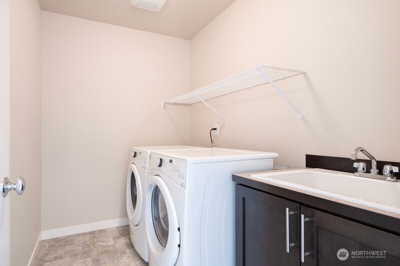 3718 226th Place Southeast Bothell, WA 98021 - Photo 21 of 30 a utility room with dryer and washer
