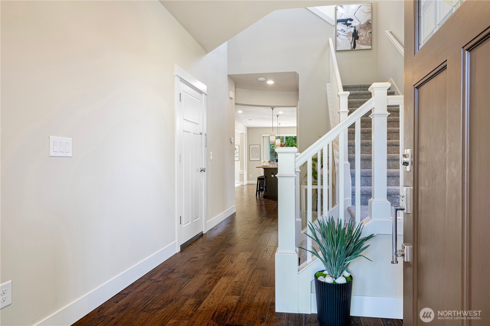 3718 226th Place Southeast Bothell, WA 98021 - Photo 3 of 30 a view of an entryway with wooden floor
