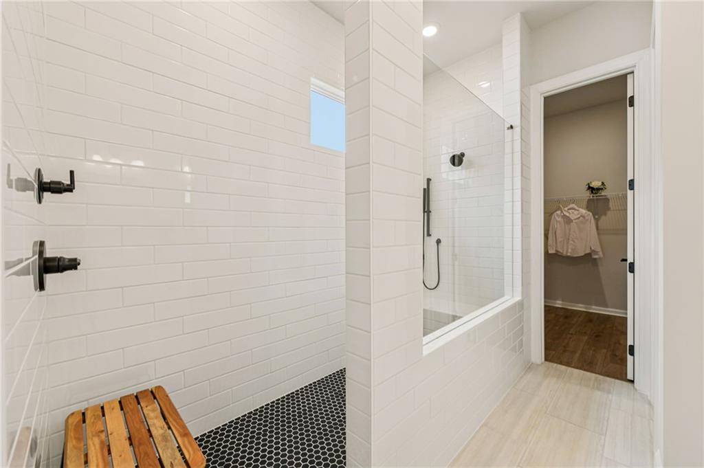 526 Pearl Street Cumming, GA 30040 - Photo 22 of 39 a bathroom with a shower