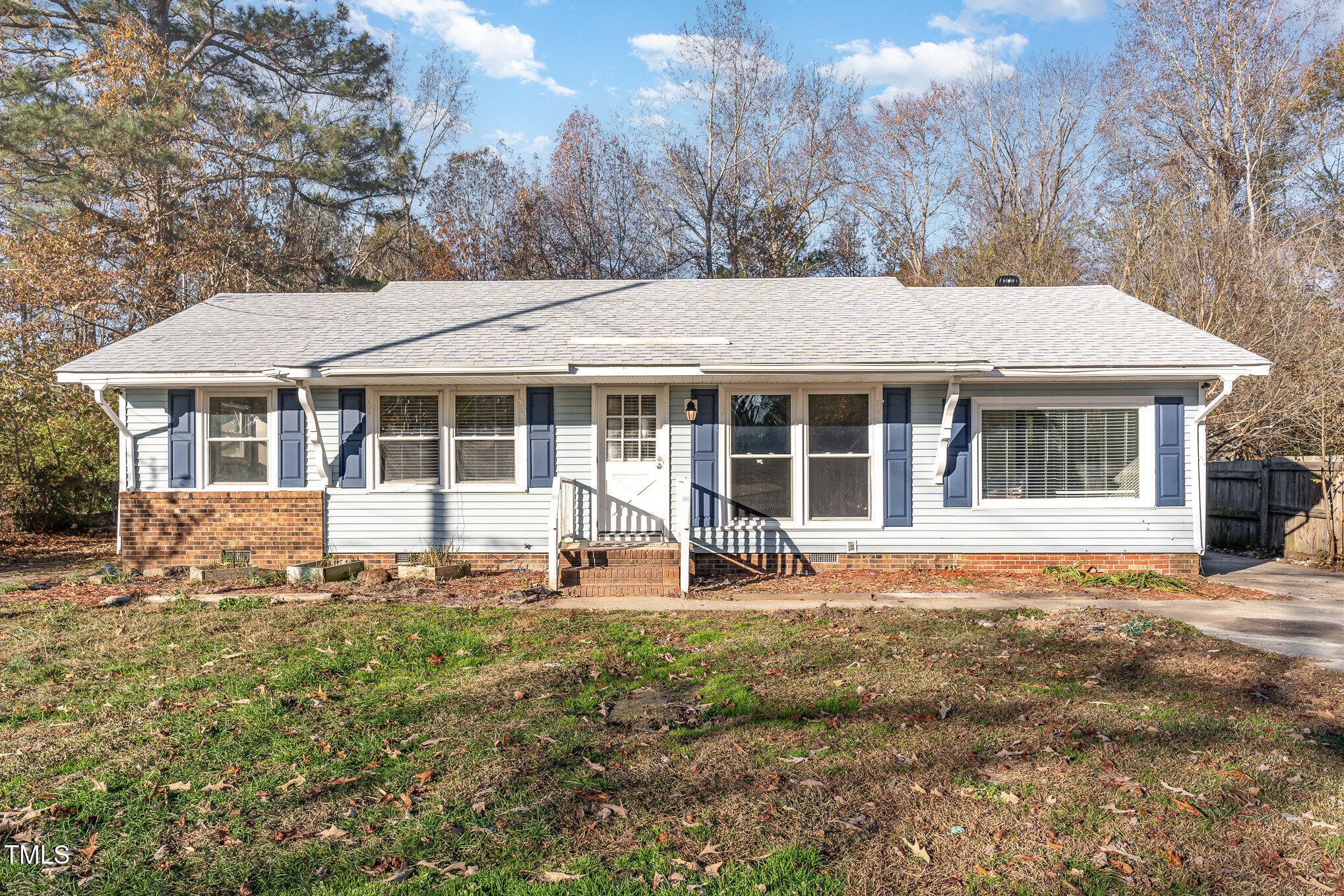 3015 Brinkley Drive Spring Lake, NC 28390 - Photo 1 of 28 front view of a house with a yard