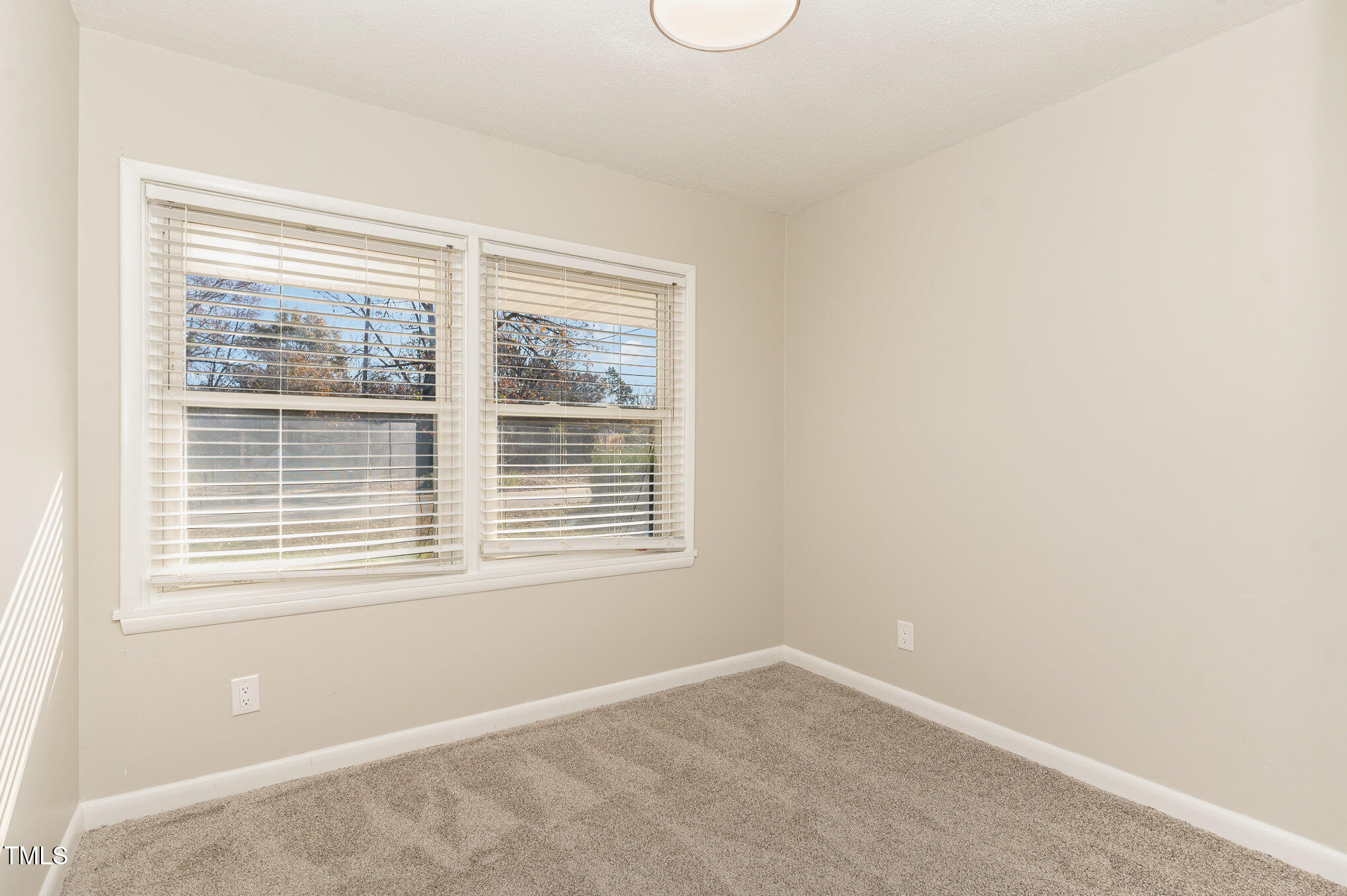 3015 Brinkley Drive Spring Lake, NC 28390 - Photo 17 of 28 a view of an empty room with a window