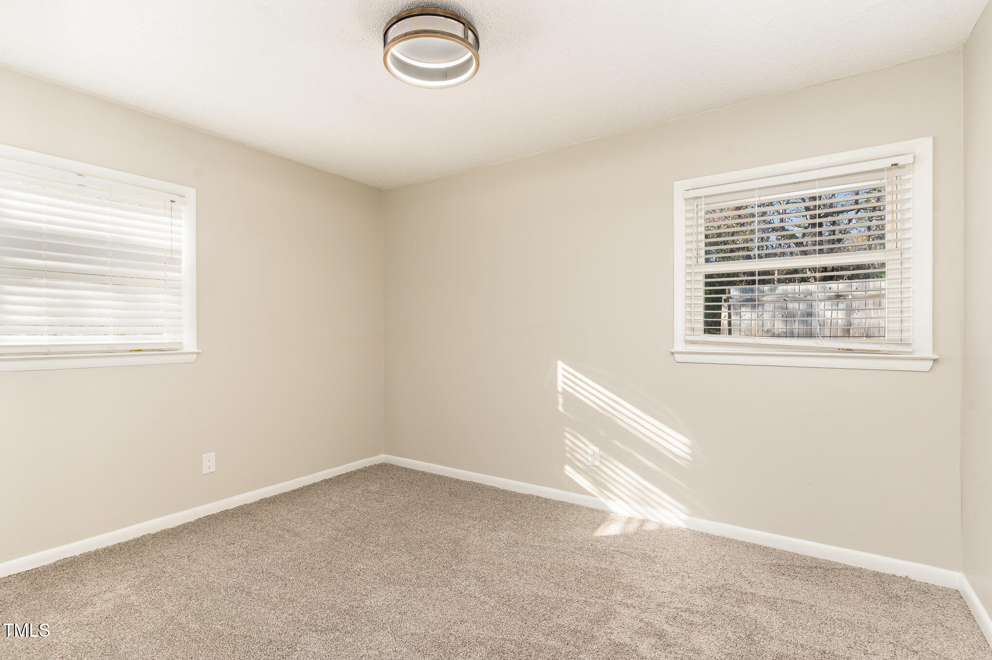 3015 Brinkley Drive Spring Lake, NC 28390 - Photo 21 of 28 an empty room with a window