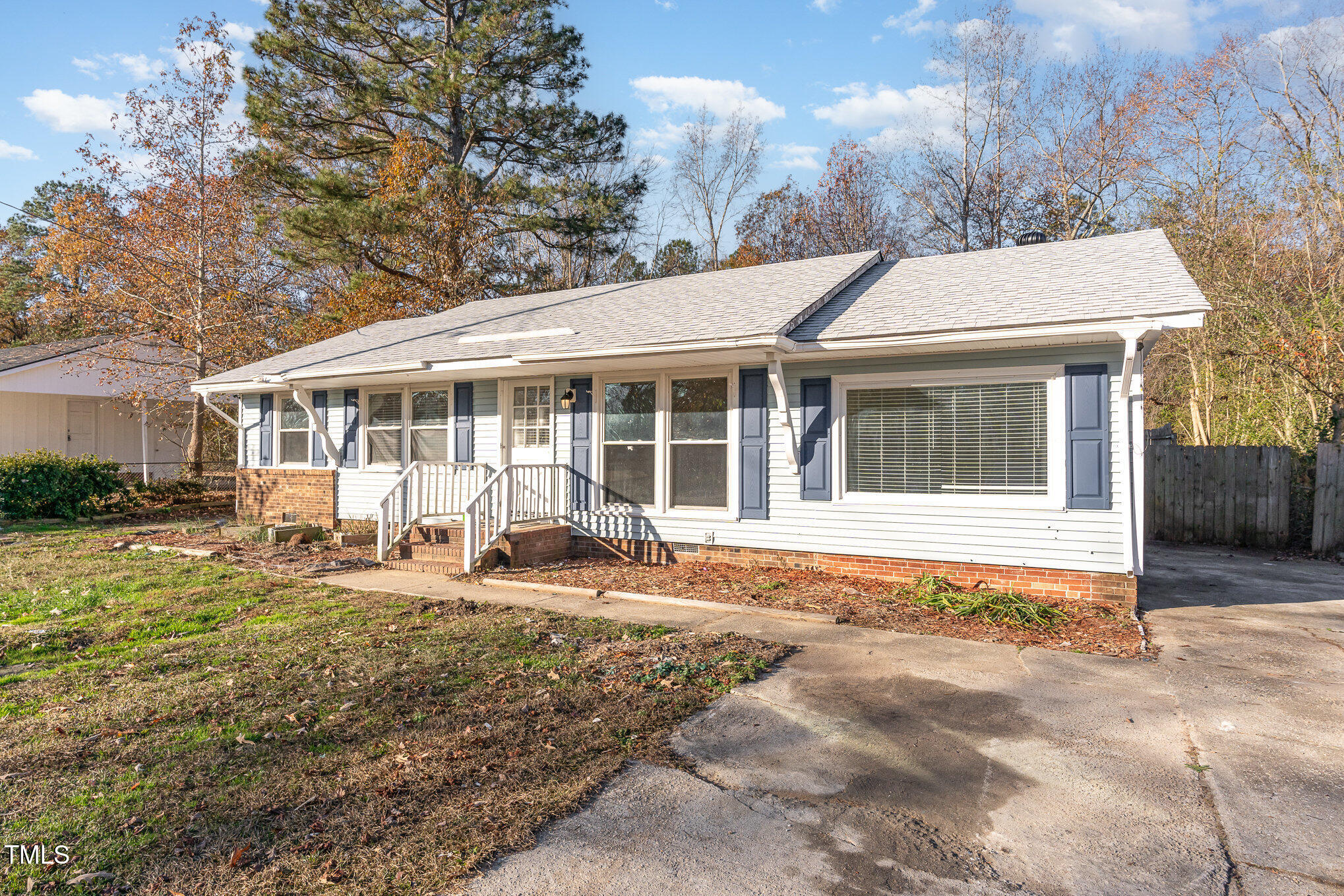 3015 Brinkley Drive Spring Lake, NC 28390 - Photo 3 of 28 a house with yard in front of it