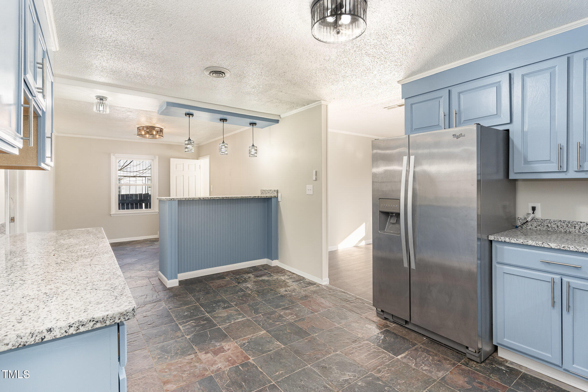 3015 Brinkley Drive Spring Lake, NC 28390 - Photo 9 of 28 a kitchen with stainless steel appliances granite countertop a refrigerator and a sink