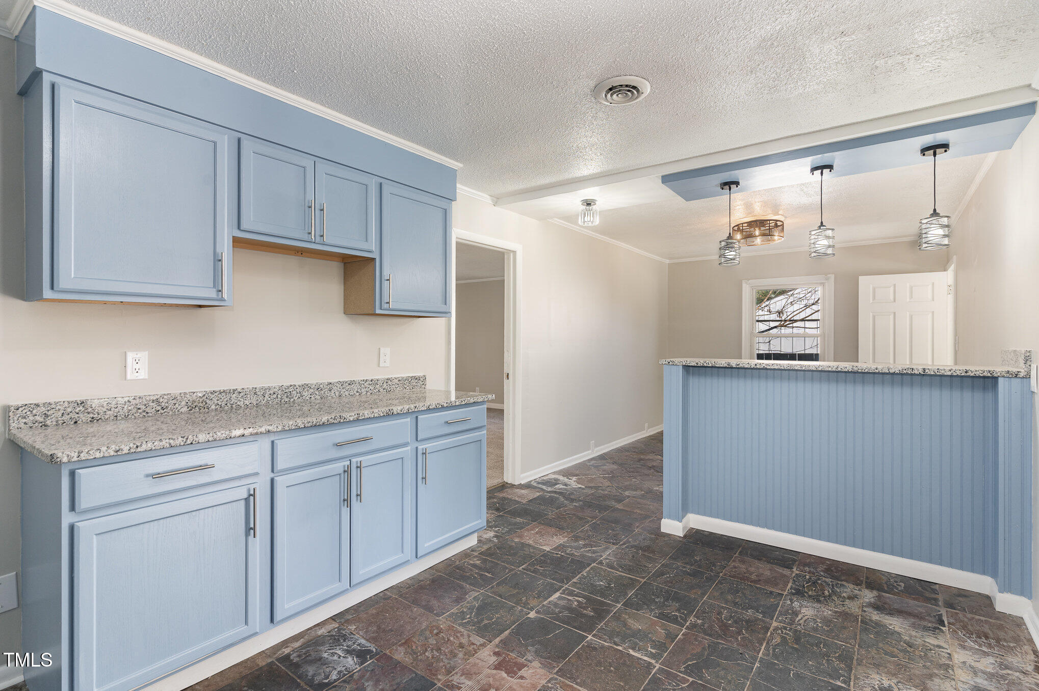 3015 Brinkley Drive Spring Lake, NC 28390 - Photo 10 of 28 a kitchen with granite countertop white cabinets and white appliances