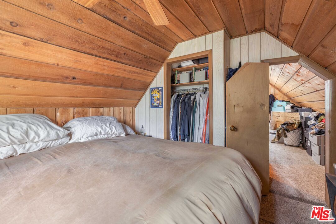 64050 Gallatin Road Gallatin Gateway, MT 59730 - Photo 13 of 55 a view of a bedroom with clothes and shoes