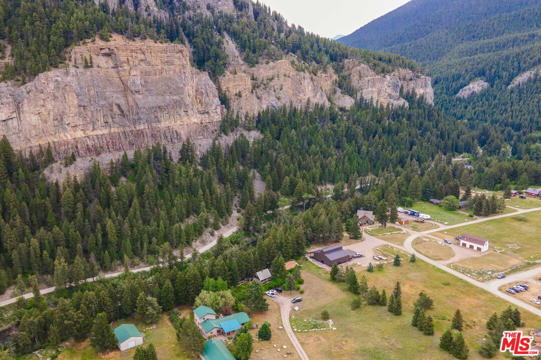 64050 Gallatin Road Gallatin Gateway, MT 59730 - Photo 26 of 55 a view of a houses with a yard