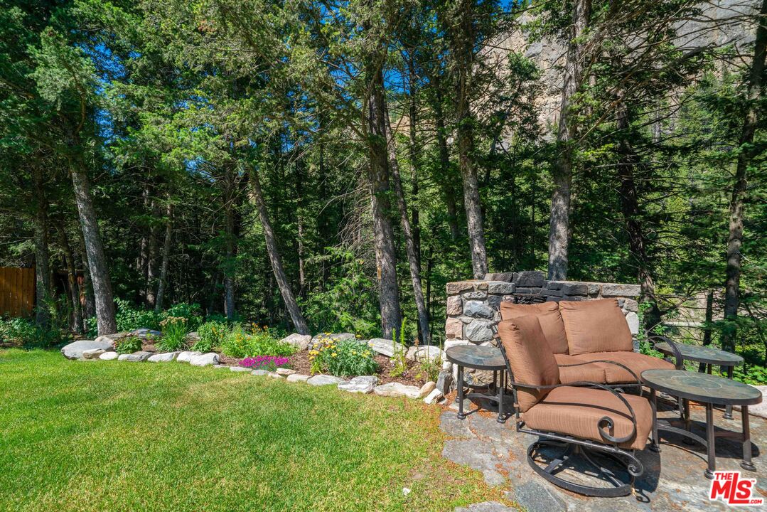 64050 Gallatin Road Gallatin Gateway, MT 59730 - Photo 42 of 55 a view of backyard with furniture and garden