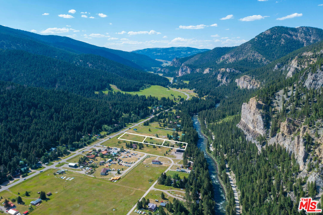 64050 Gallatin Road Gallatin Gateway, MT 59730 - Photo 55 of 55 an aerial view of a house with a yard