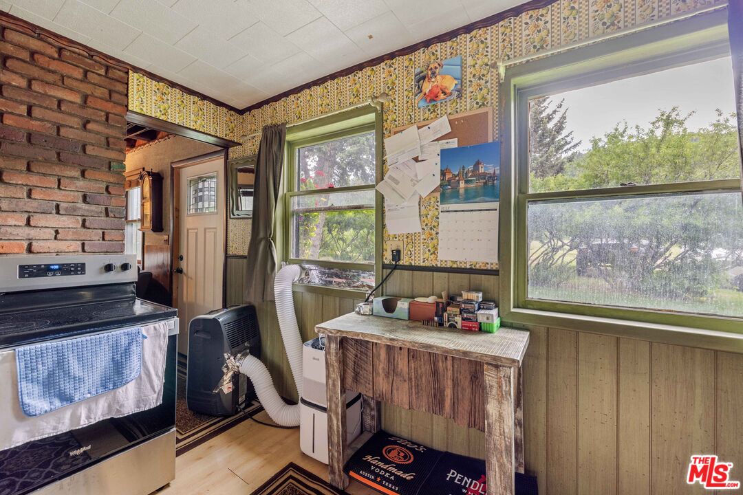 64050 Gallatin Road Gallatin Gateway, MT 59730 - Photo 6 of 55 a living room with furniture and a window