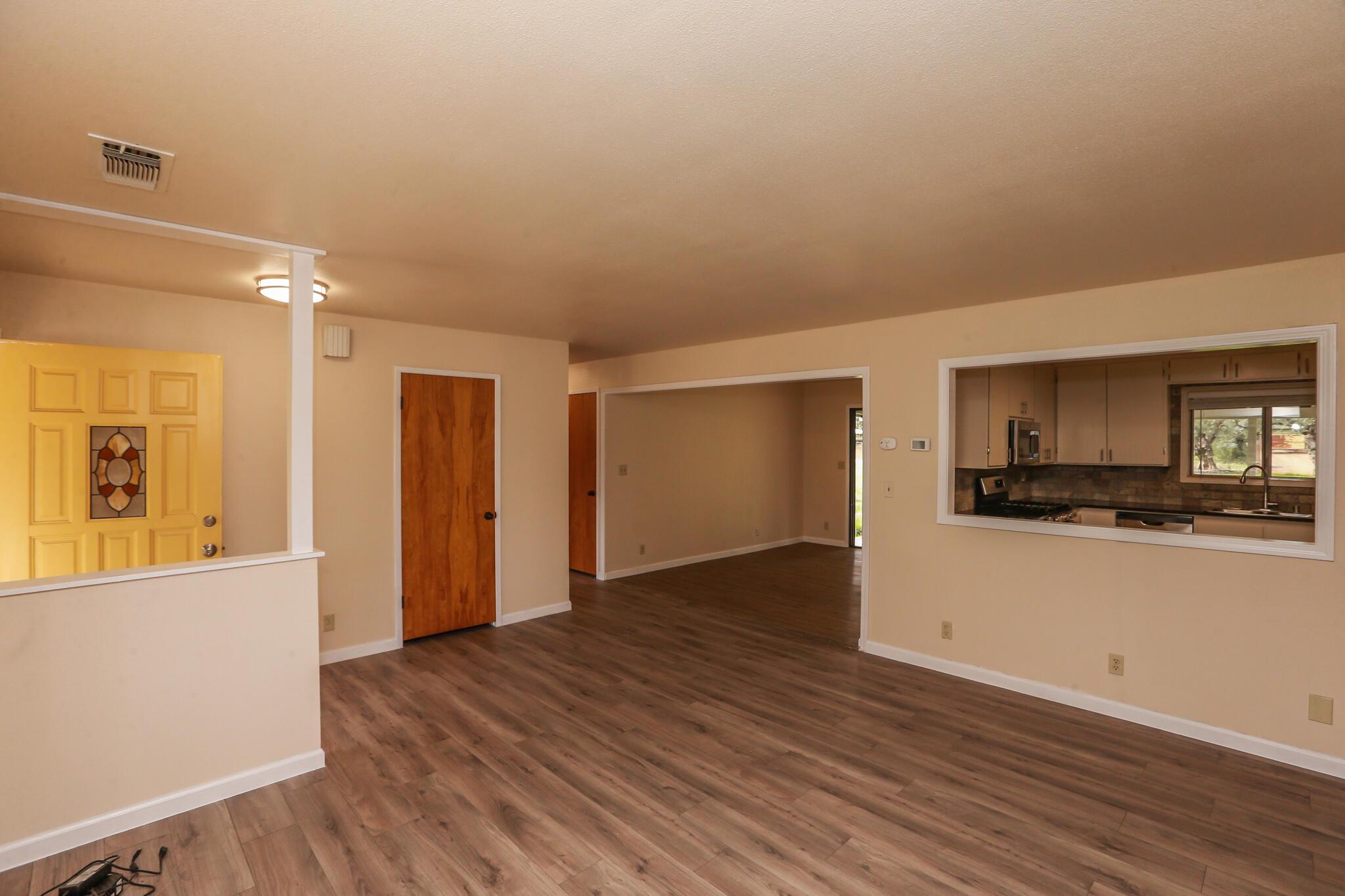 5572 Olive Street Anderson, CA 96007 - Photo 8 of 31 a view of a kitchen with a sink and a refrigerator