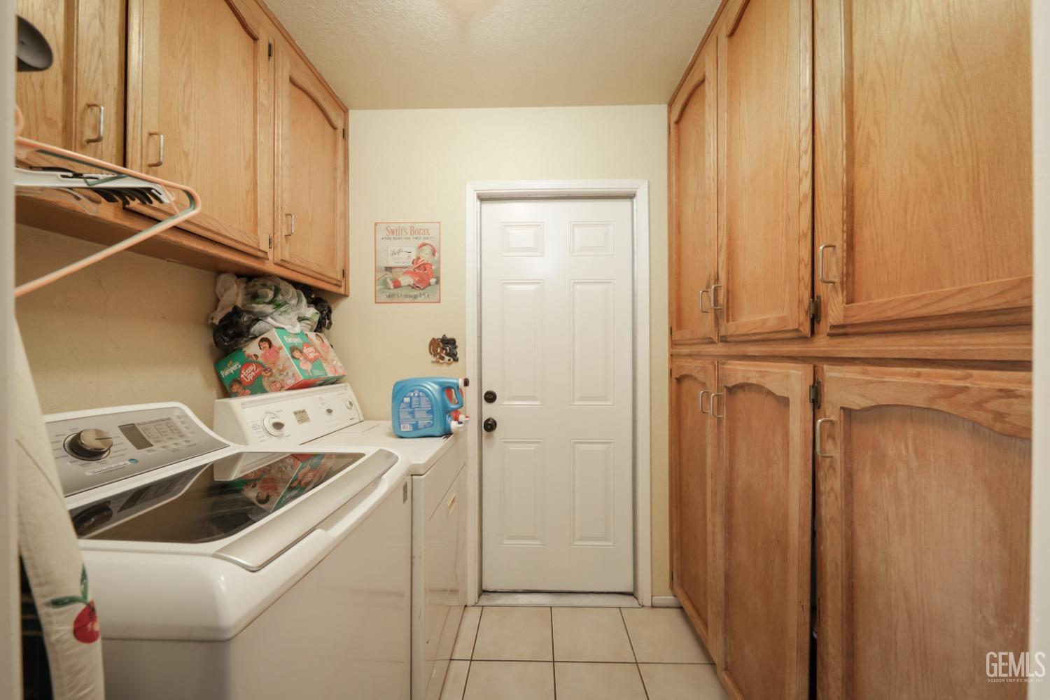 Undisclosed Address Bakersfield, CA 93314 - Photo 22 of 29 a utility room with dryer and washer