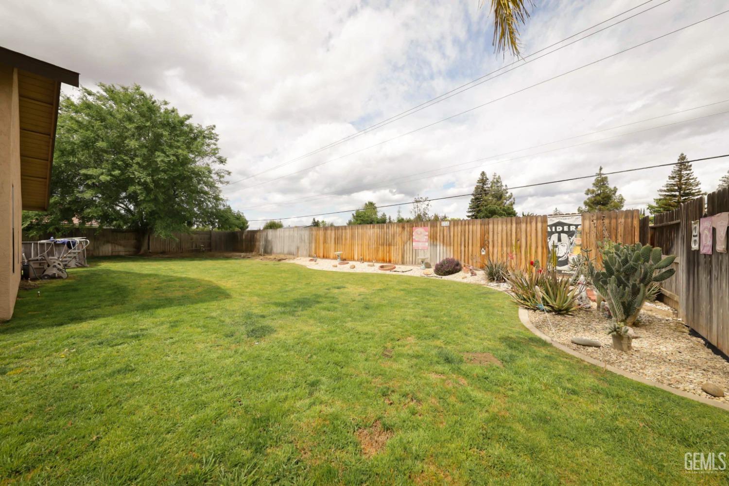 Undisclosed Address Bakersfield, CA 93314 - Photo 24 of 29 a view of a garden