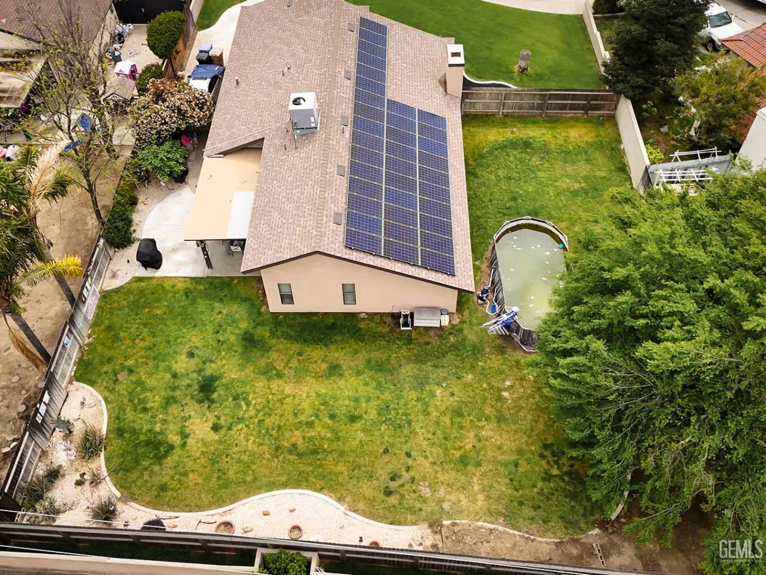 Undisclosed Address Bakersfield, CA 93314 - Photo 28 of 29 a view of a garden with a lounge chair