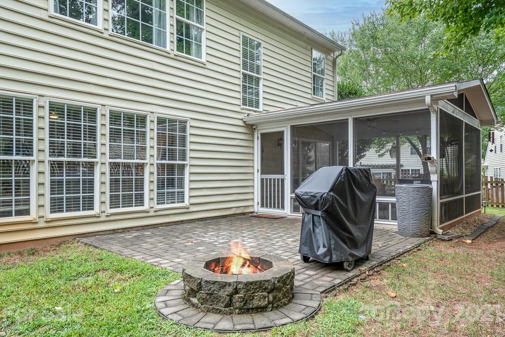 18122 Bluff Inlet Road Cornelius, NC 28031 - Photo 30 of 34 a view of a porch with furniture
