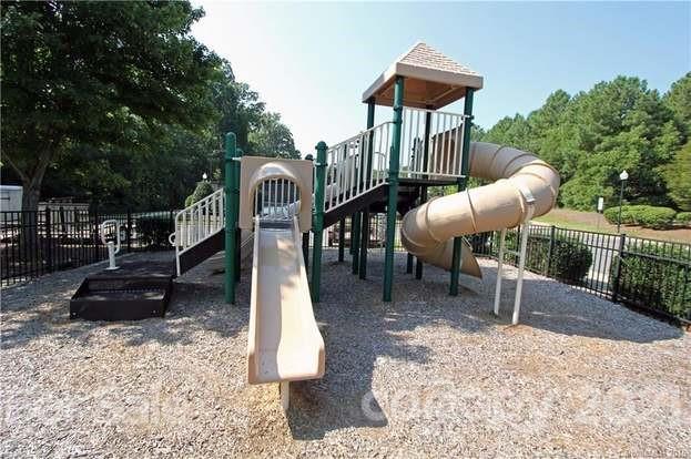 18122 Bluff Inlet Road Cornelius, NC 28031 - Photo 33 of 34 a view of a slide with a bench