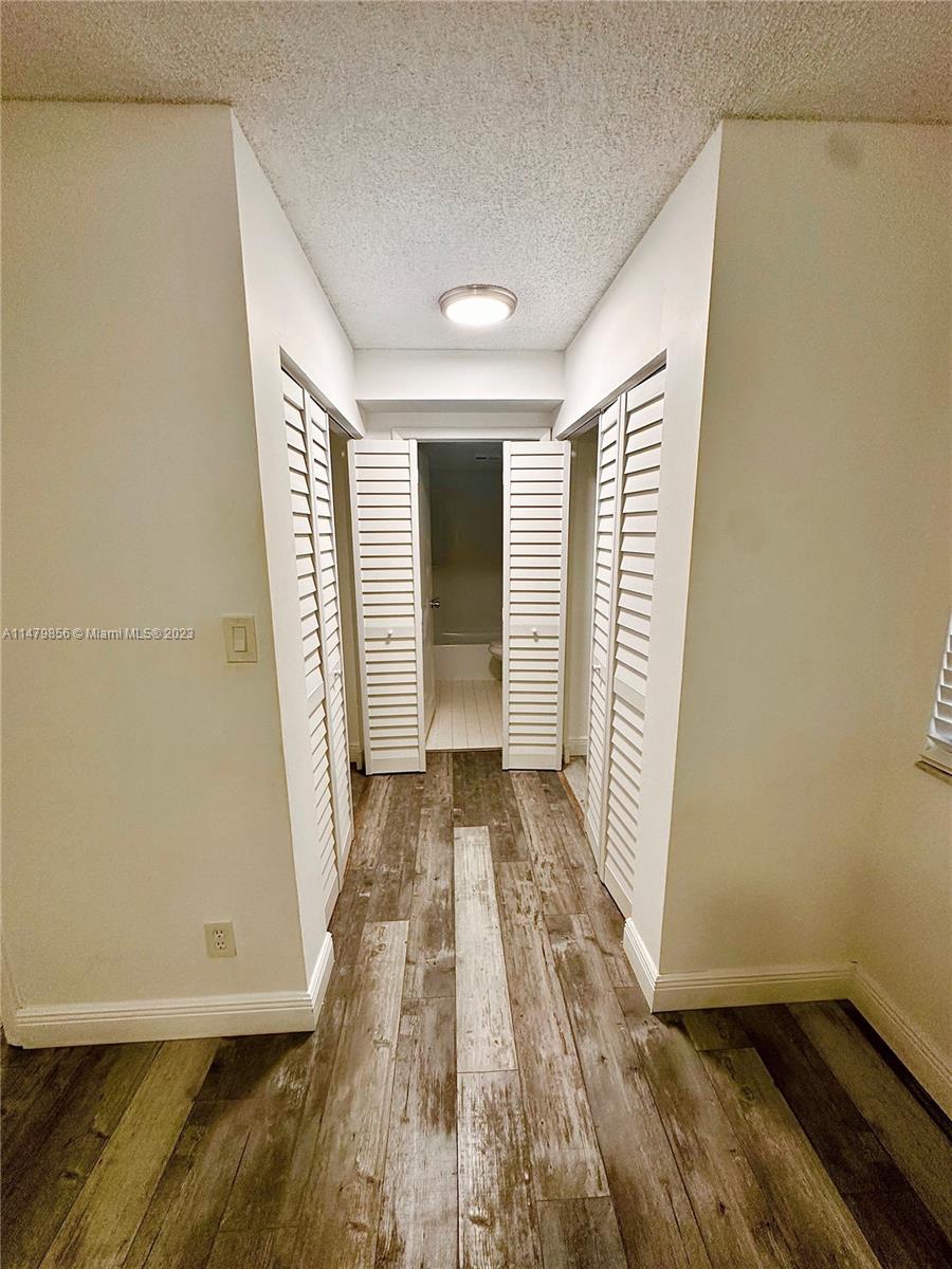 530 South Park Road, Unit 1711 Hollywood, FL 33021 - Photo 16 of 25 a view of a room with wooden floor and a window