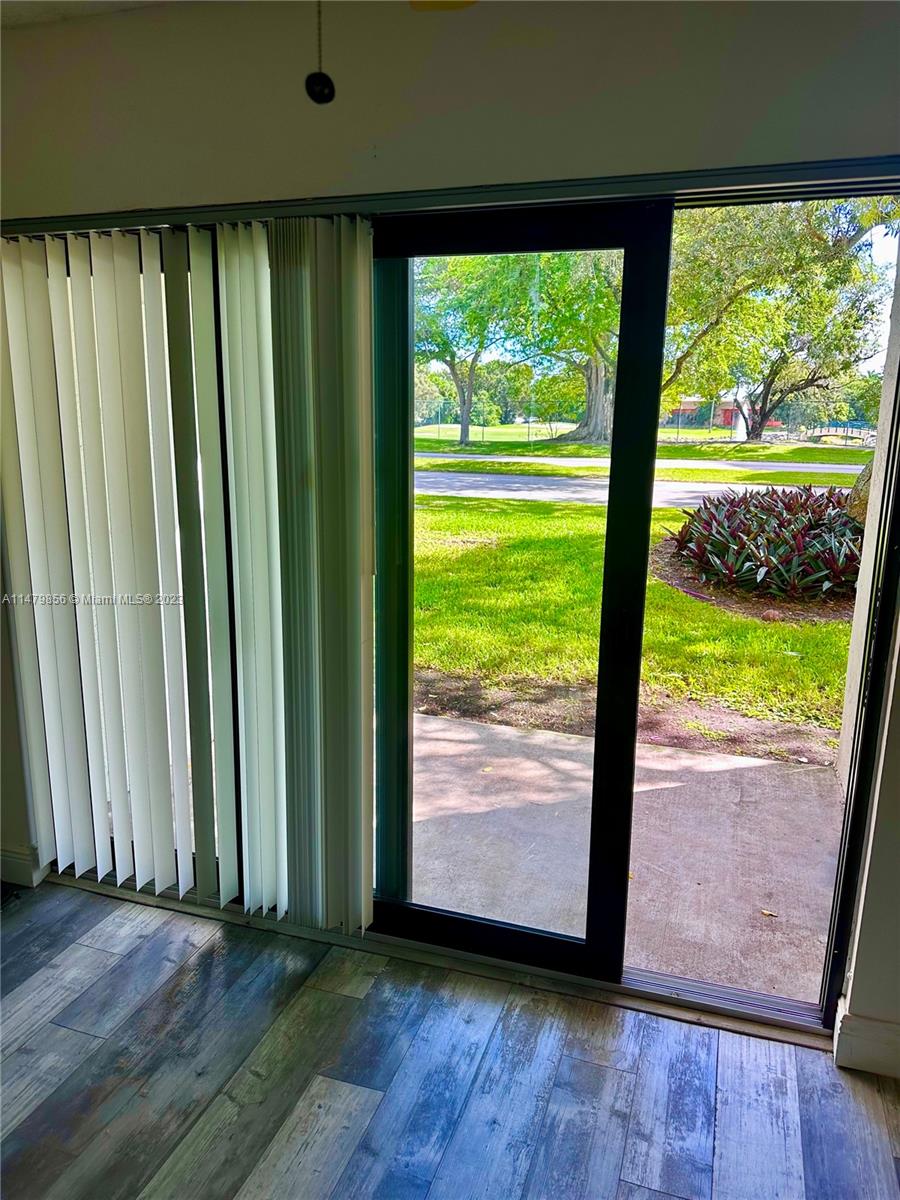 530 South Park Road, Unit 1711 Hollywood, FL 33021 - Photo 18 of 25 a view of front door with wooden floor