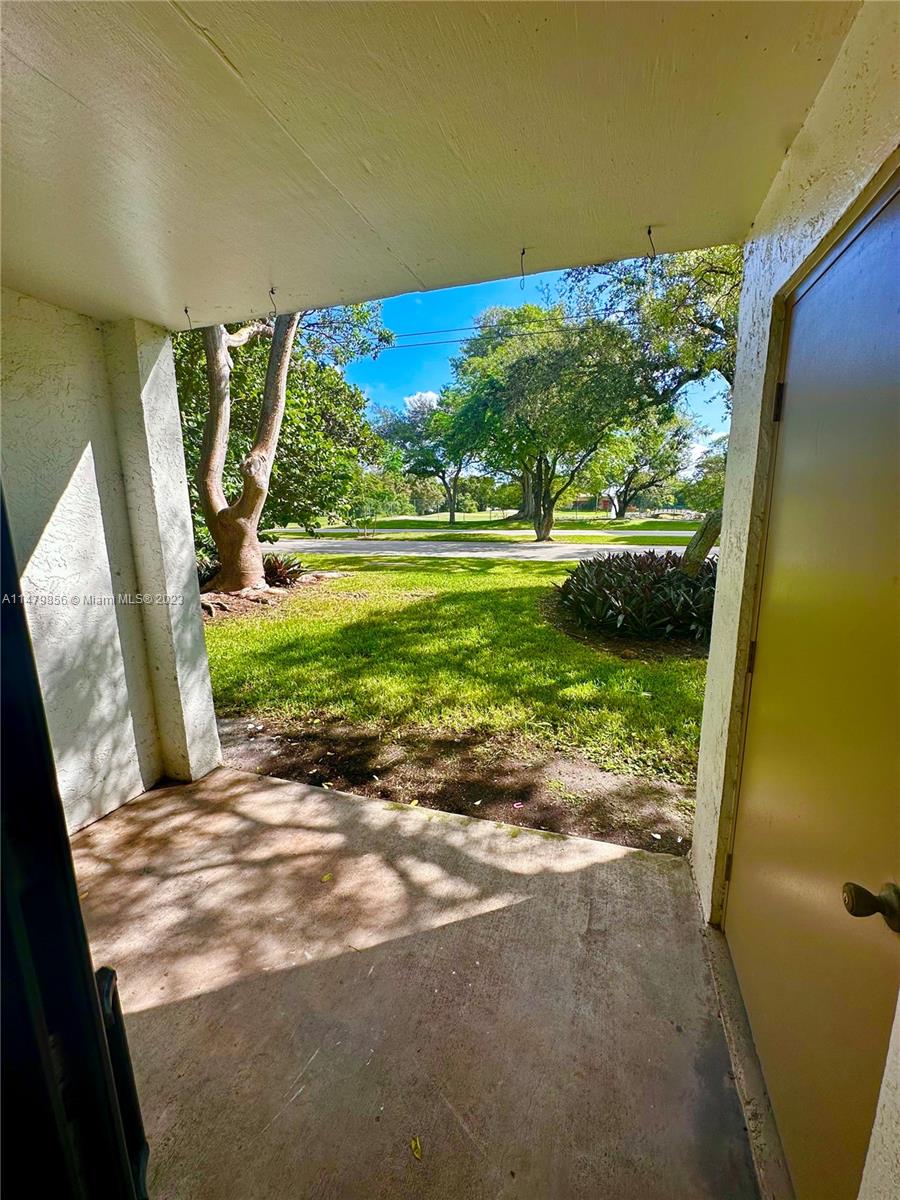 530 South Park Road, Unit 1711 Hollywood, FL 33021 - Photo 19 of 25 a view of a porch with garden