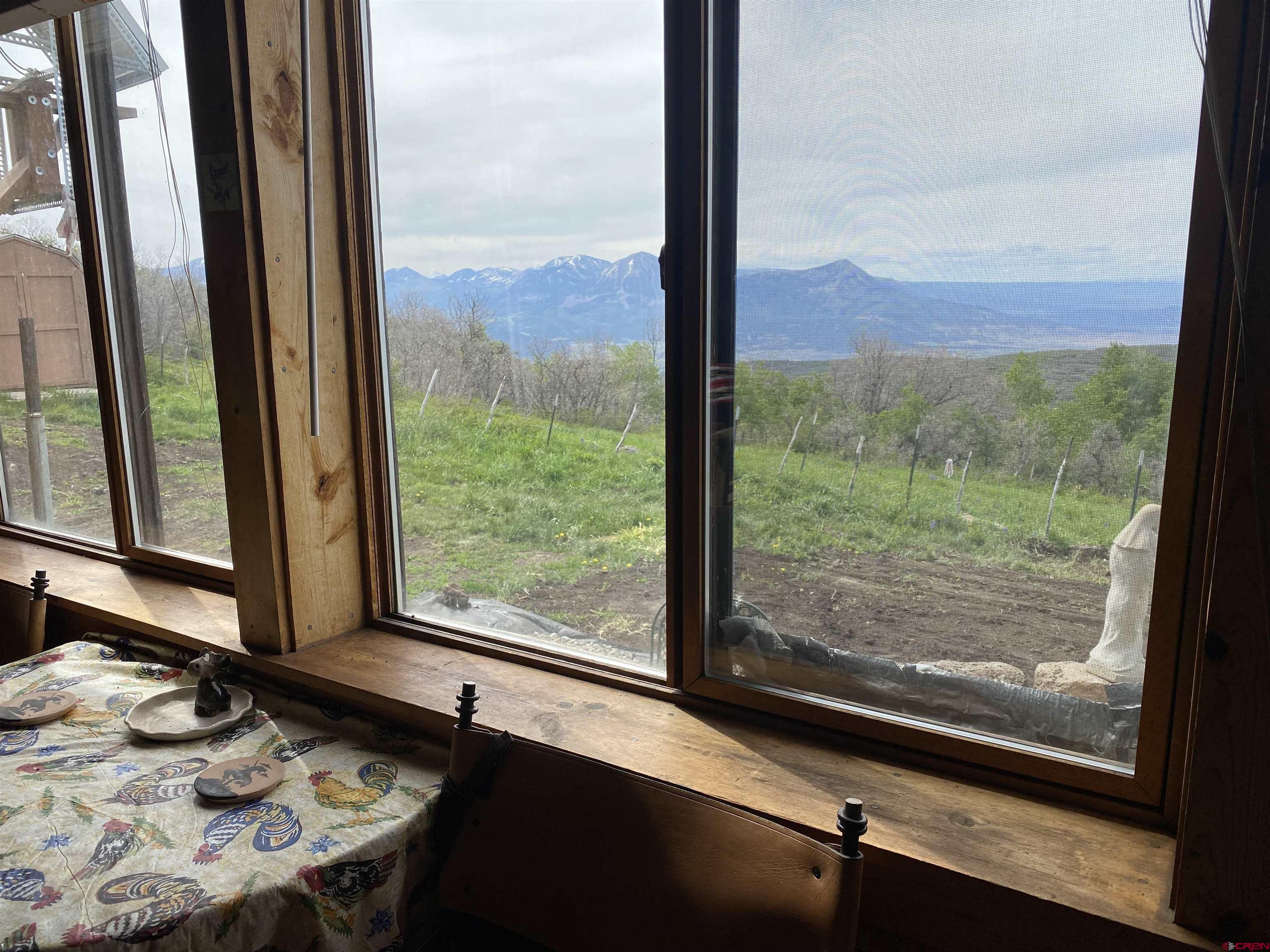 19514 Johnson Road Hotchkiss, CO 81419 - Photo 4 of 27 a room with furniture and window
