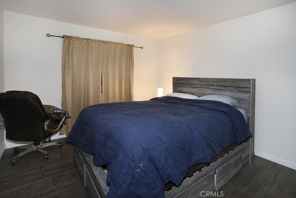 27603 Genevieve Drive Menifee, CA 92586 - Photo 4 of 11 a bed sitting in a room next to a window