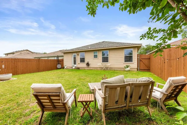 a view of yard with outdoor seating