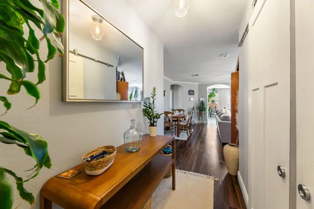 a room with furniture and a mirror