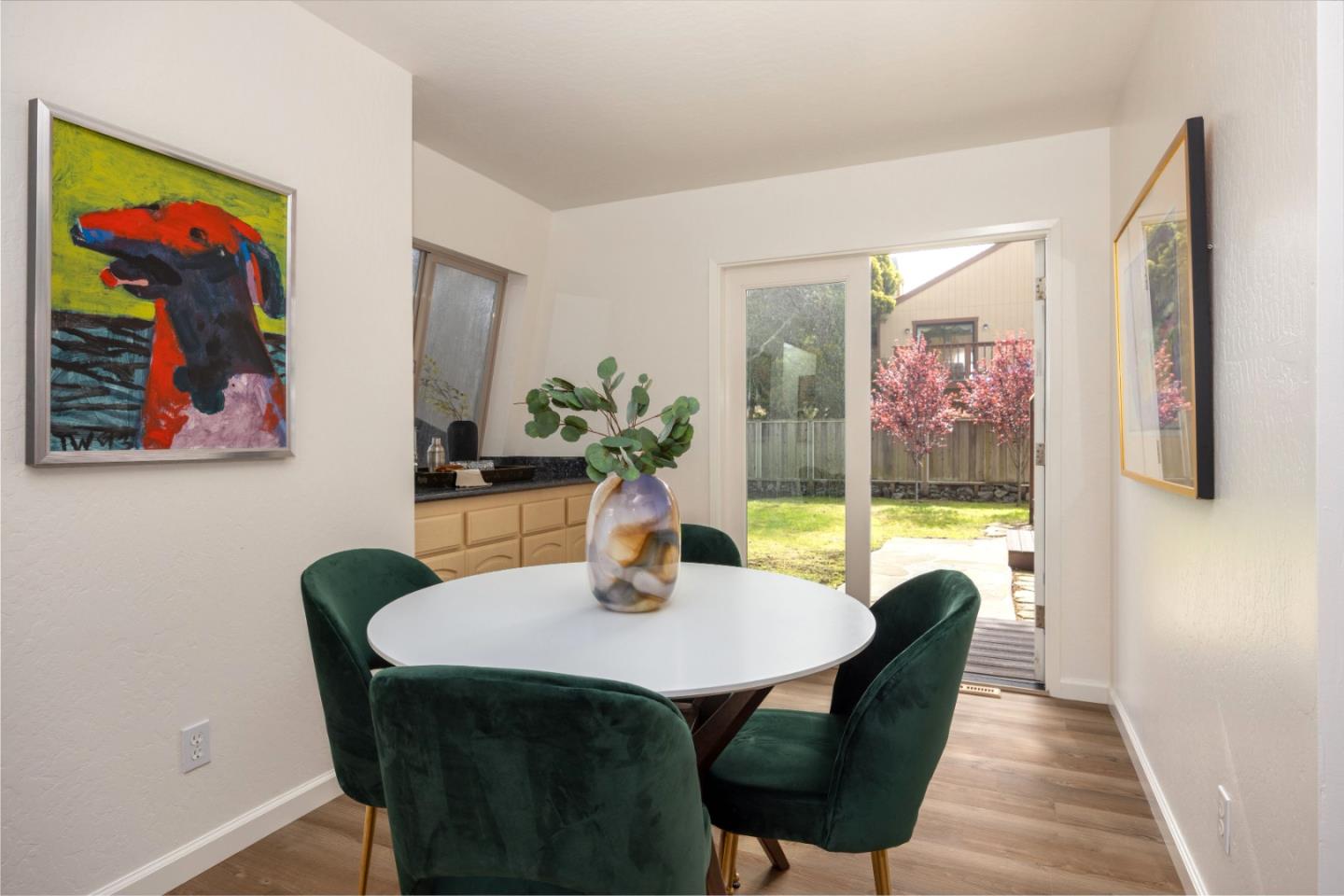 314 Roosevelt Boulevard Half Moon Bay, CA 94019 - Photo 17 of 58 a dining room with furniture and wooden floor