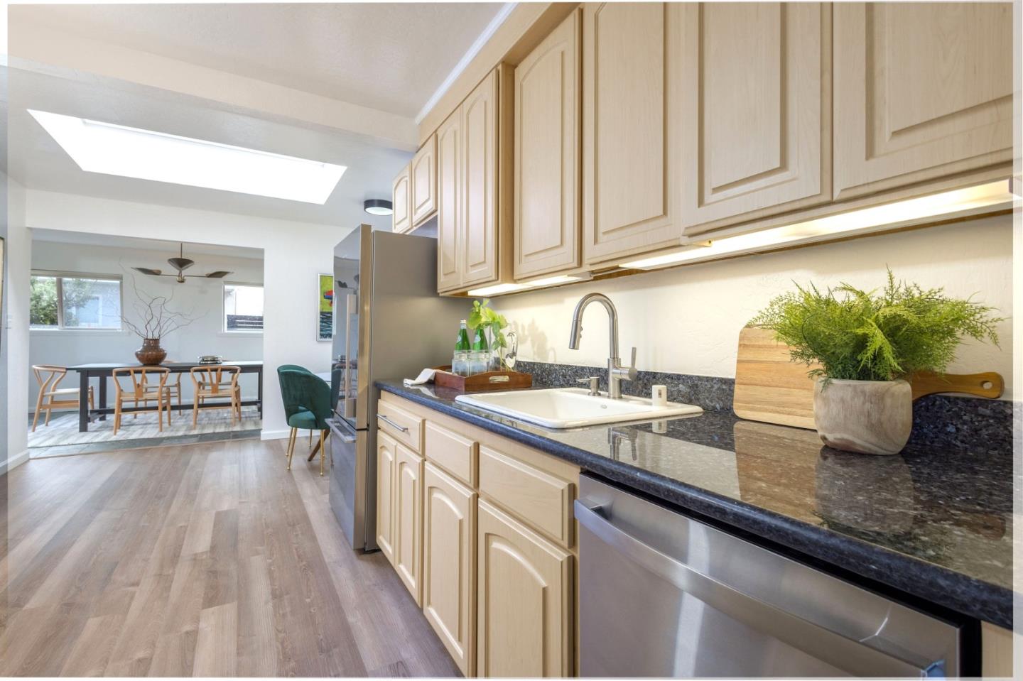 314 Roosevelt Boulevard Half Moon Bay, CA 94019 - Photo 24 of 58 a kitchen with sink and cabinets