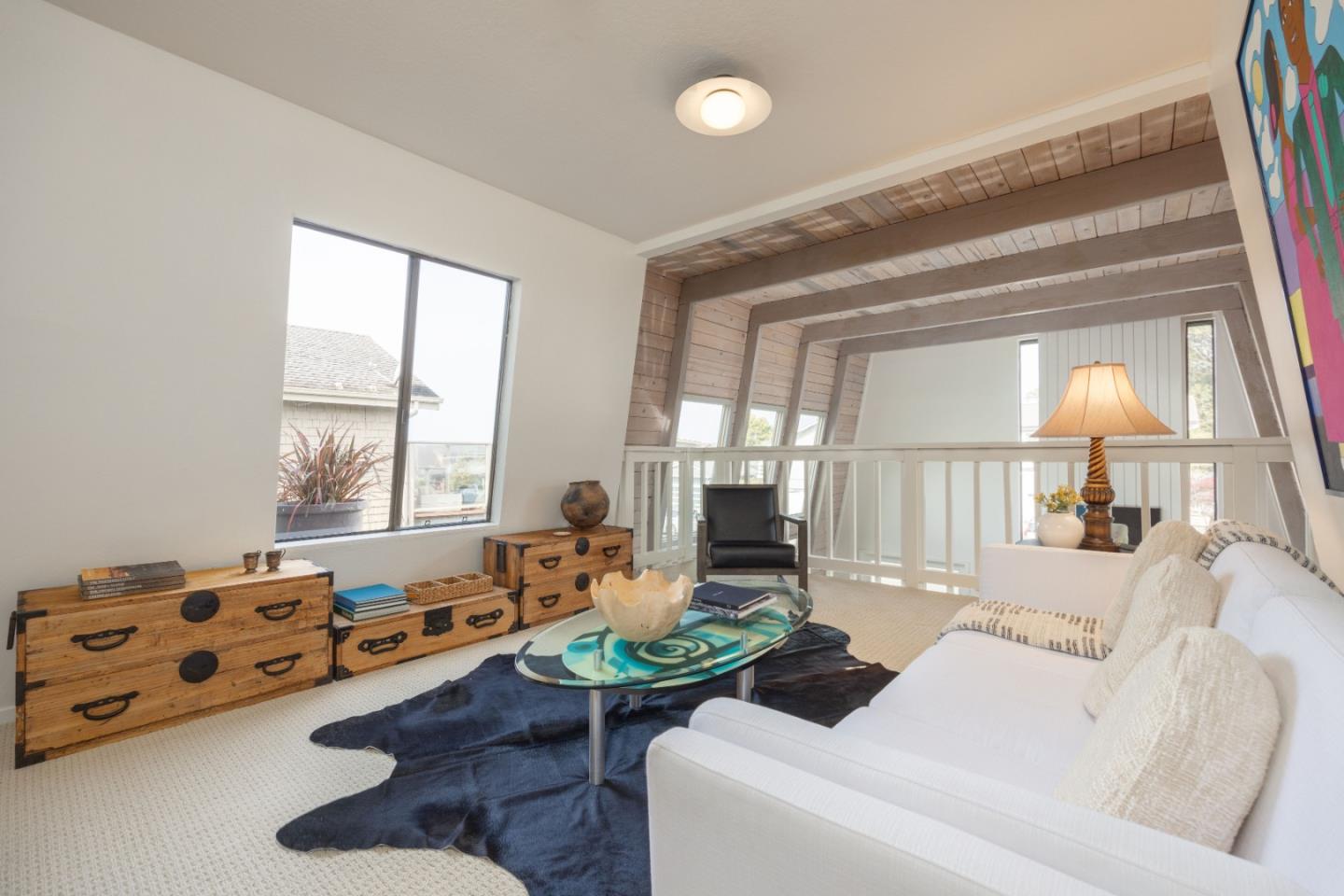 314 Roosevelt Boulevard Half Moon Bay, CA 94019 - Photo 32 of 58 a living room with furniture and a large window