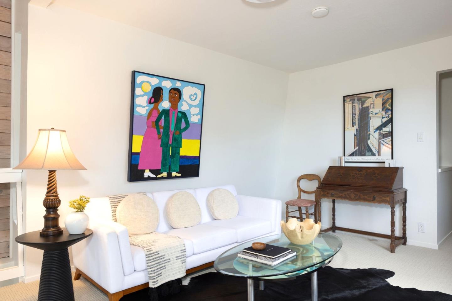 314 Roosevelt Boulevard Half Moon Bay, CA 94019 - Photo 33 of 58 a living room with furniture and a lamp