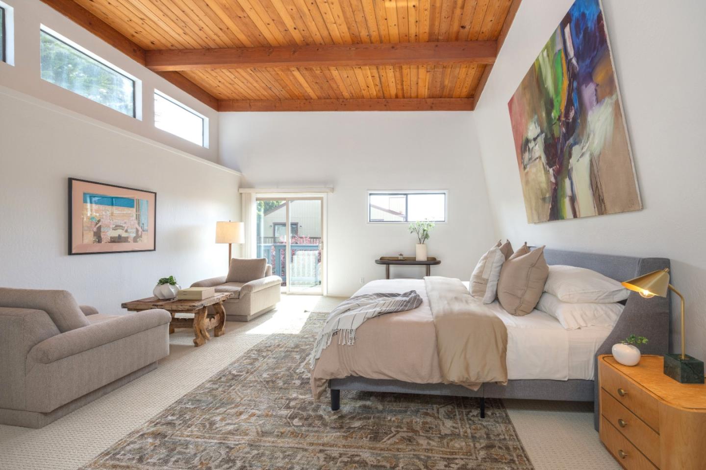 314 Roosevelt Boulevard Half Moon Bay, CA 94019 - Photo 35 of 58 a bedroom with a bed a couch and a window