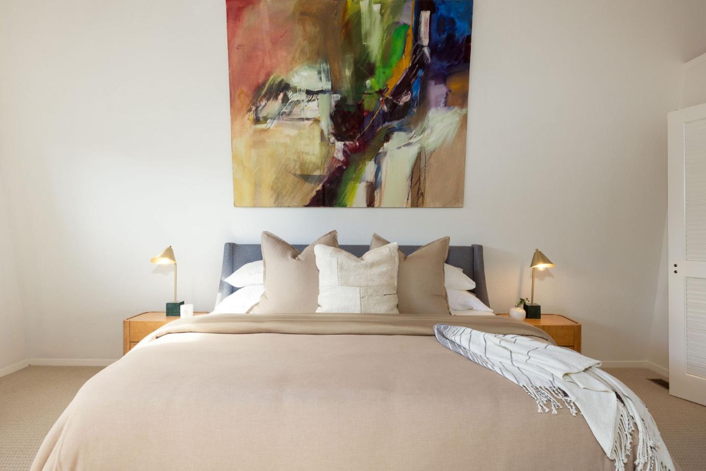 314 Roosevelt Boulevard Half Moon Bay, CA 94019 - Photo 38 of 58 a bedroom with a bed and a mirror