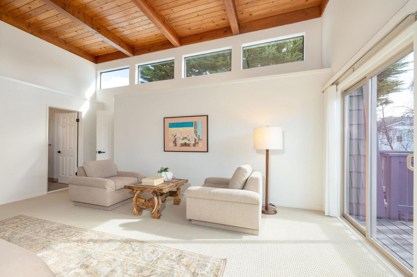 314 Roosevelt Boulevard Half Moon Bay, CA 94019 - Photo 40 of 58 a living room with furniture and a window