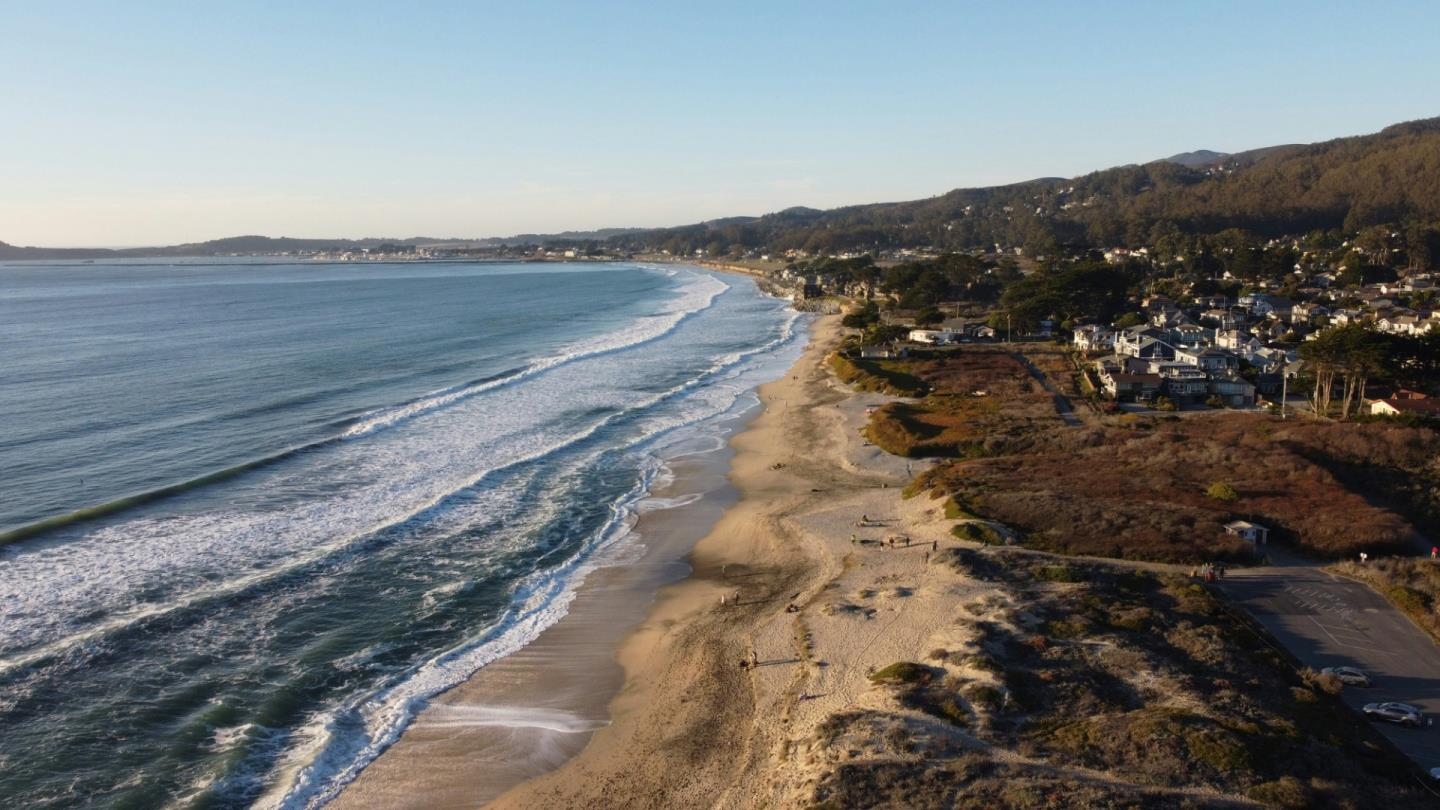 314 Roosevelt Boulevard Half Moon Bay, CA 94019 - Photo 54 of 58 a view of a dry yard with mountains in the background