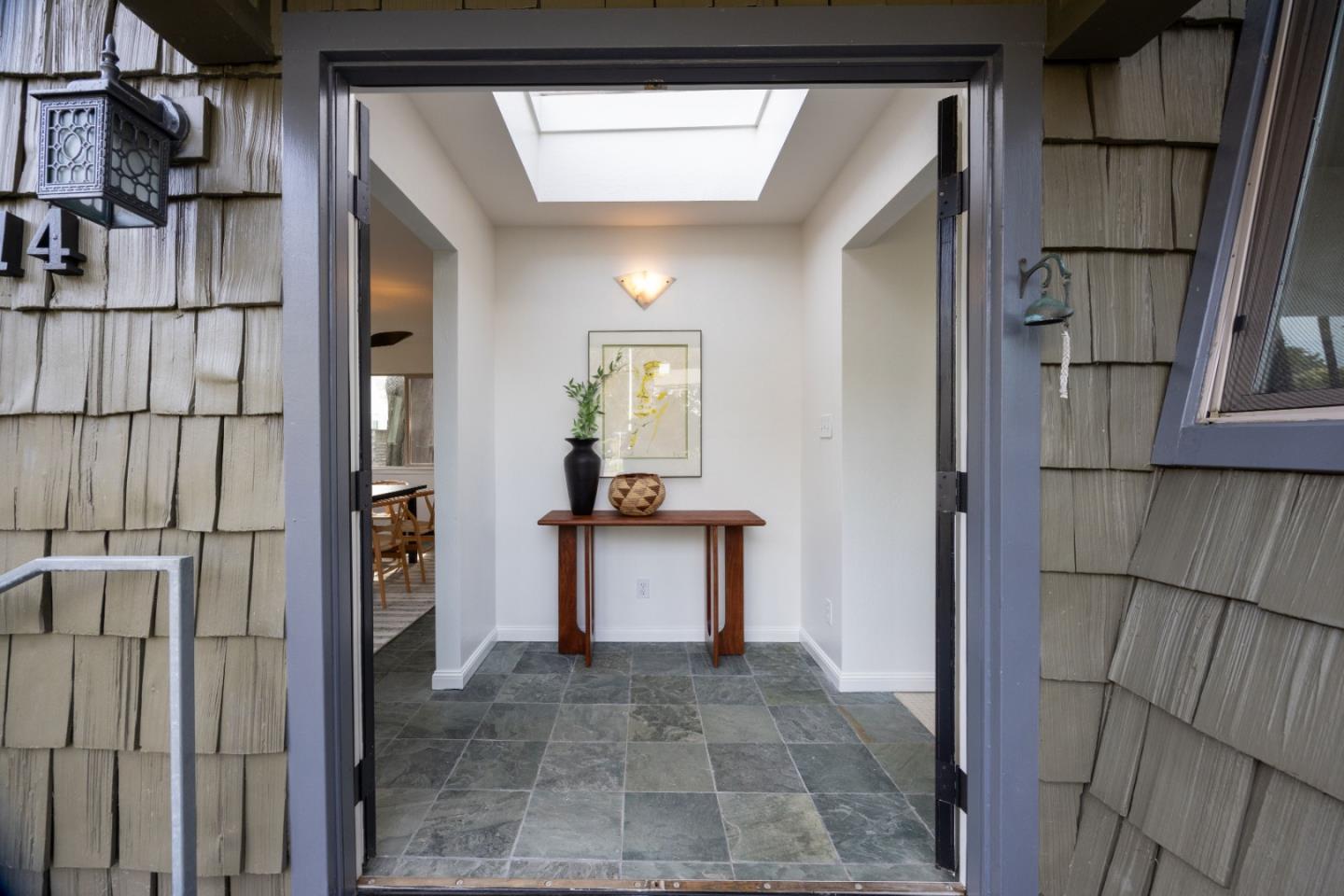 314 Roosevelt Boulevard Half Moon Bay, CA 94019 - Photo 7 of 58 a view of a kitchen from the hallway