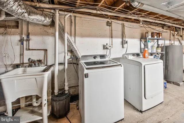 a utility room with dryer and washer