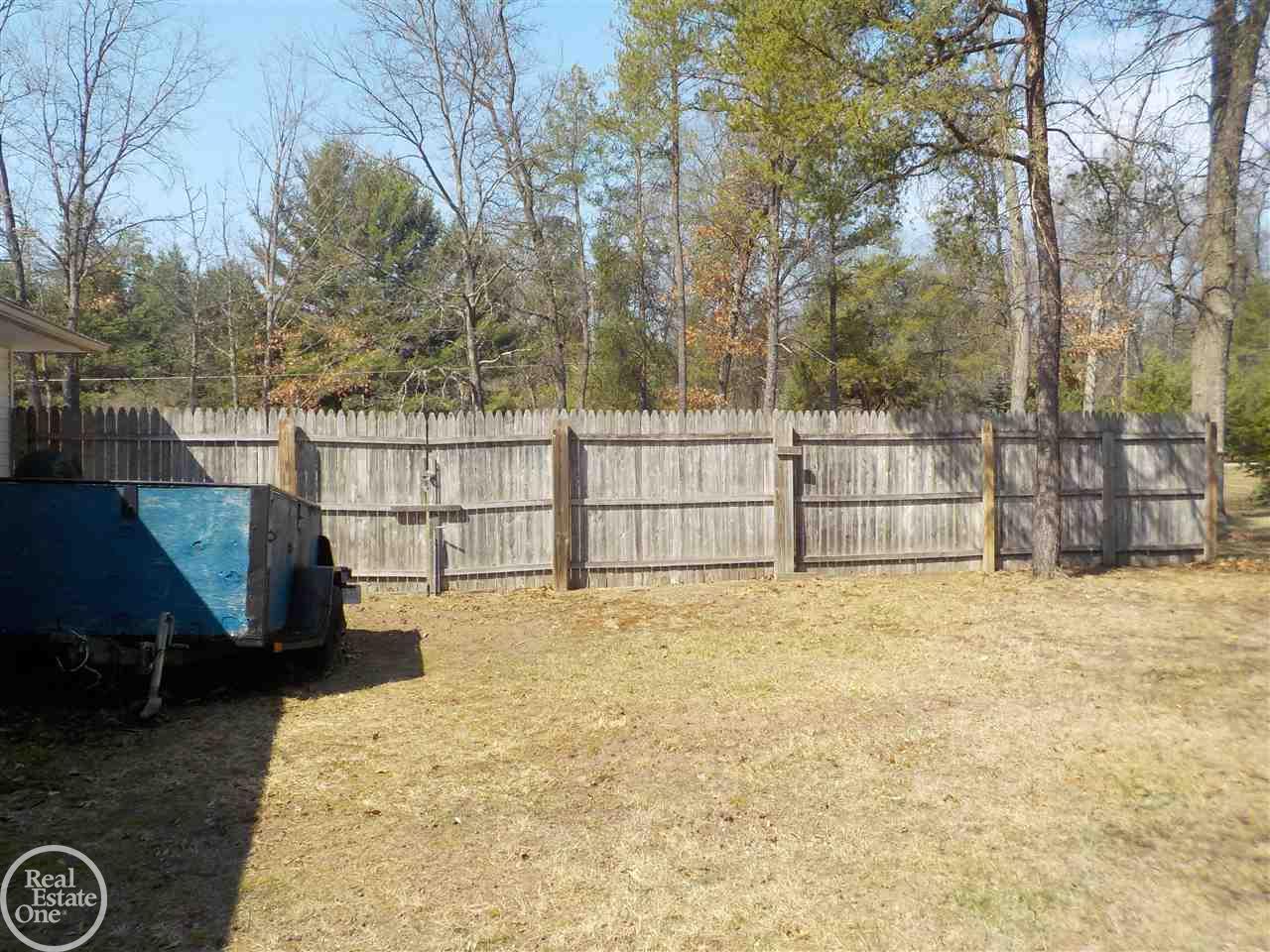 4077 Elbow Lake Road Prescott, MI 48756 - Photo 21 of 33 privacy fence and nice st