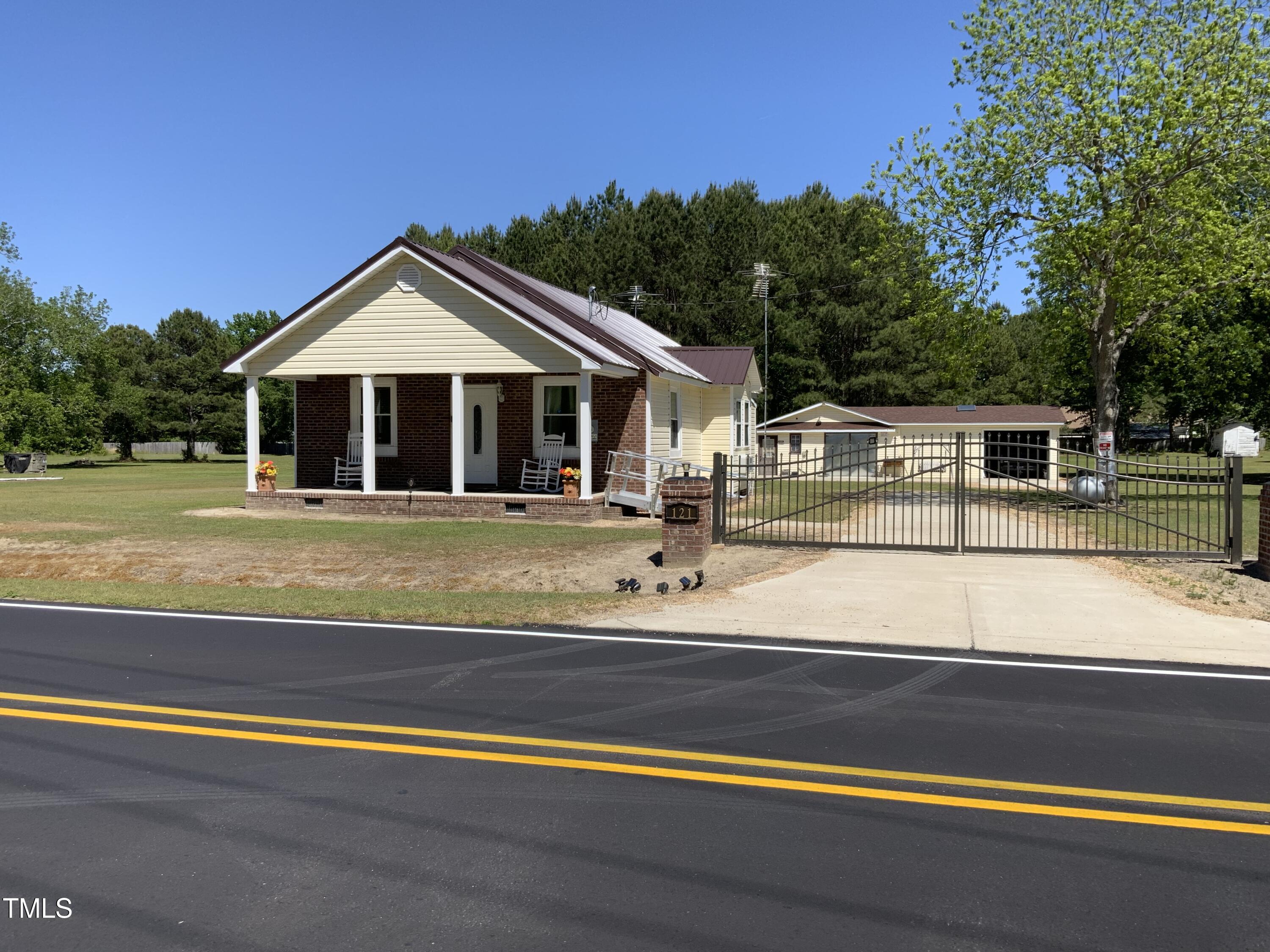 a view of a house with a swimming pool