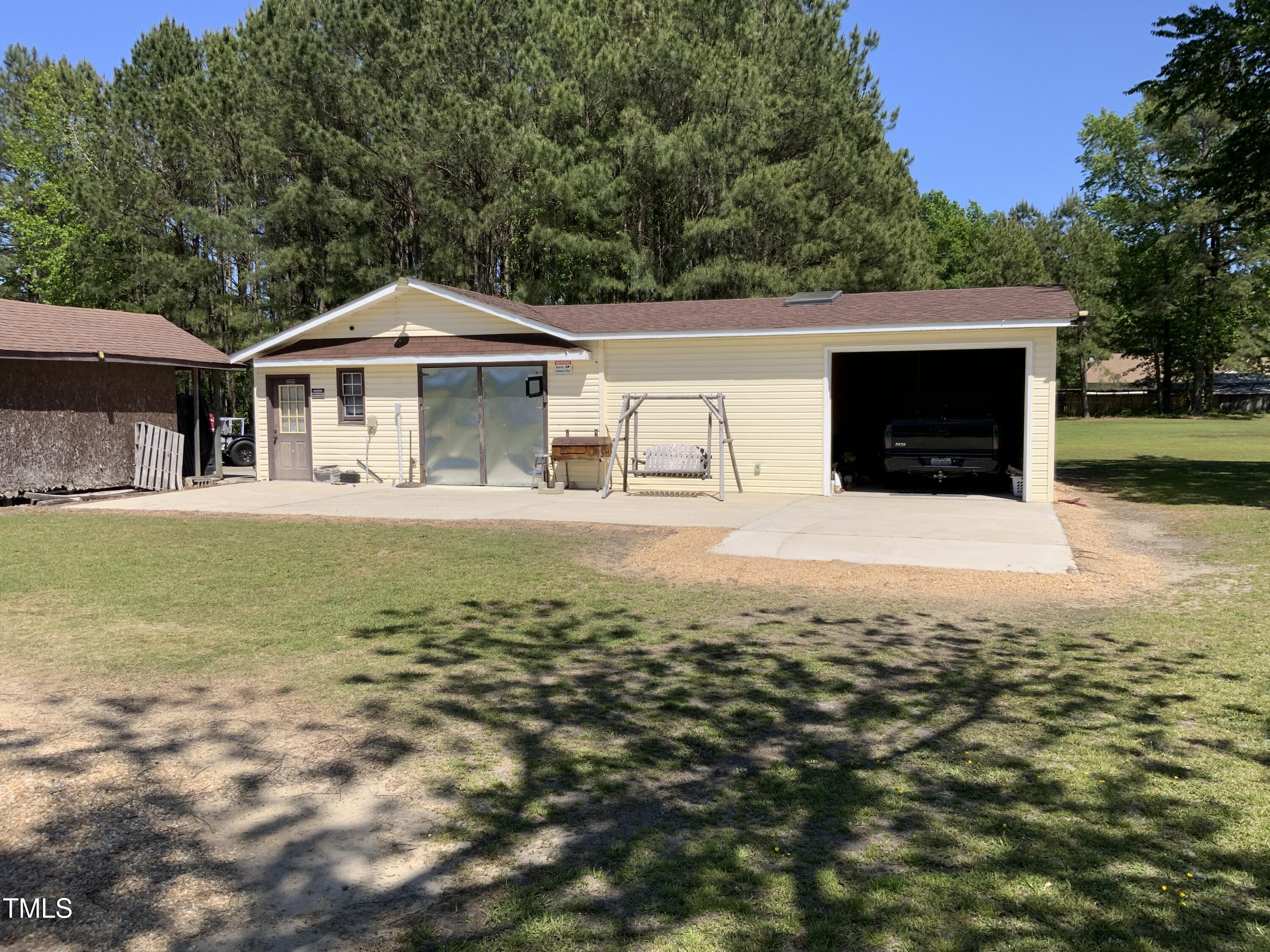 121 Storey Road Murfreesboro, NC 27855 - Photo 11 of 31 a front view of a house with garden