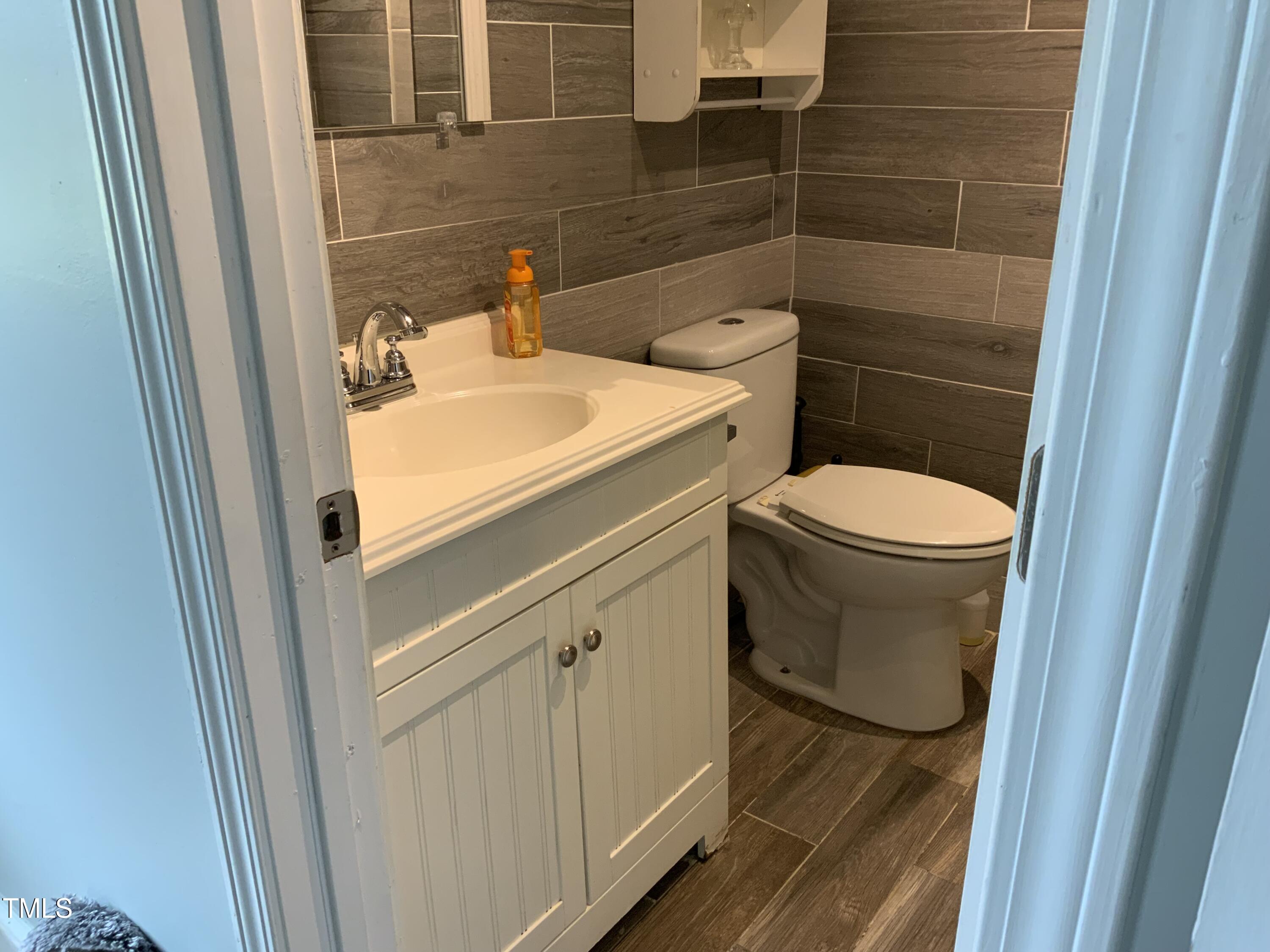 121 Storey Road Murfreesboro, NC 27855 - Photo 19 of 31 a bathroom with a sink and toilet