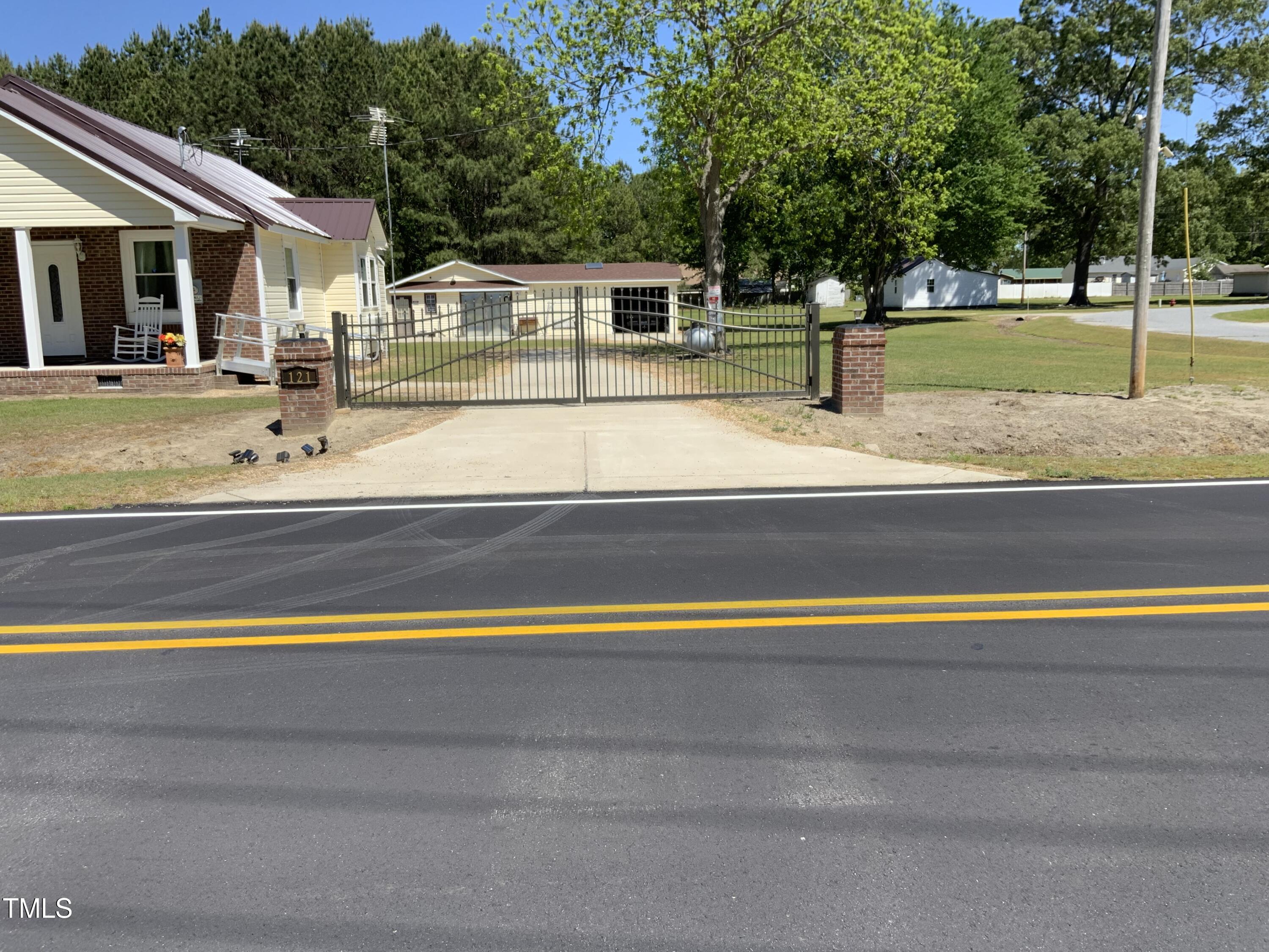 121 Storey Road Murfreesboro, NC 27855 - Photo 2 of 31 a view of a swimming pool with a patio