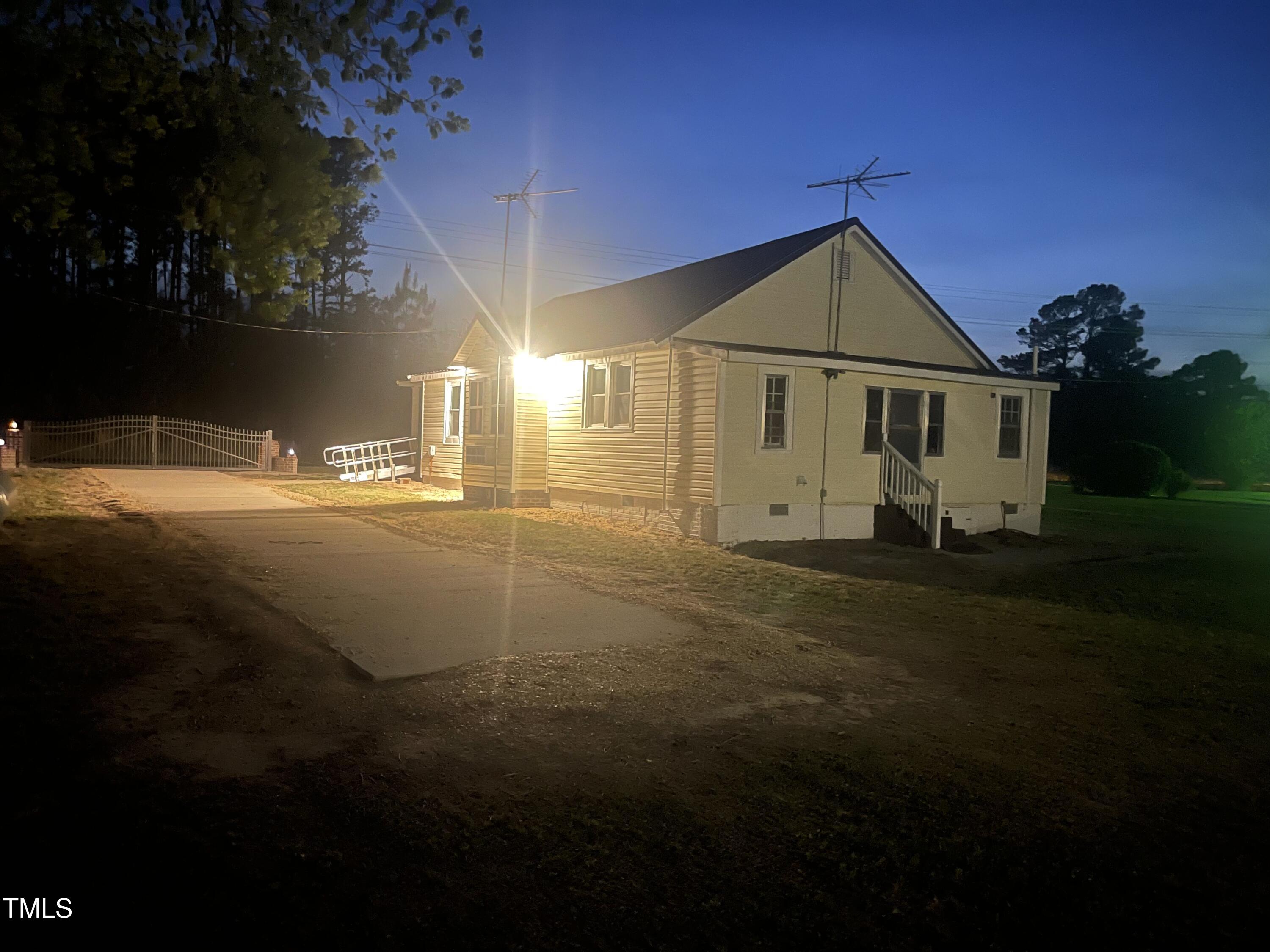 121 Storey Road Murfreesboro, NC 27855 - Photo 8 of 31 a view of a house with backyard and garden